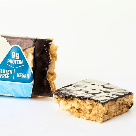 Trek Protein Flapjack Cocoa Coconut - bezglutenowy wegański baton z ciemną czekoladą 9g białka by Trek (trek-protein-flapjack-cocoa-coconut-bezglutenowy-weganski-baton-z-ciemna-czekolada-9g-bialka)